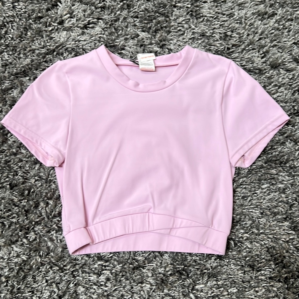 Pink cropped workout short sleeve top from Pretty Little Thing